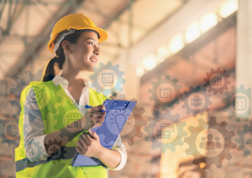 Woman wearing ppe holding clip board
