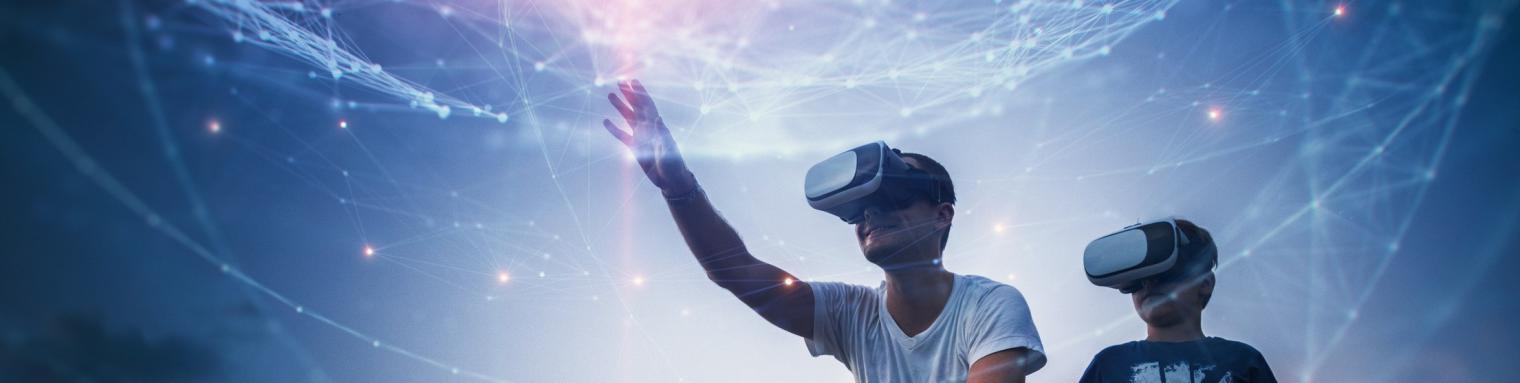 Man and child use virtual reality