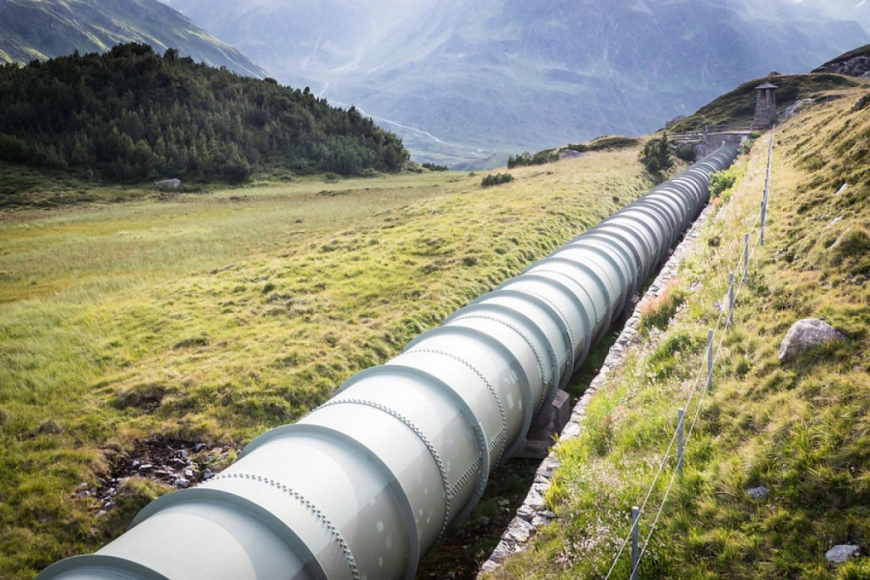 Pipeline through grassy field 