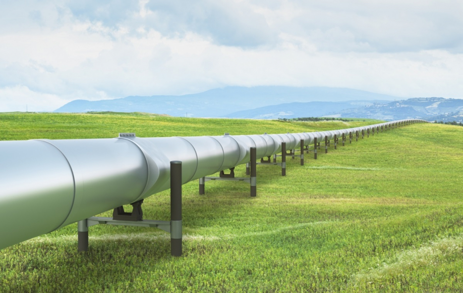 Pipeline through grassy field 