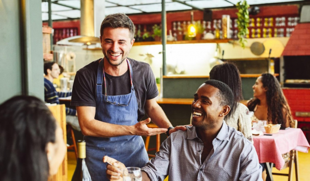 Waiter serving a table