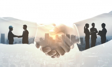 Two people shaking hands