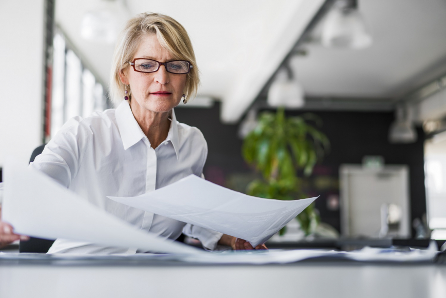 Woman Reviewing Documents